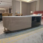 Two-Tone Curved TV Stand with White Marble Top and High-Gloss Wood Panels